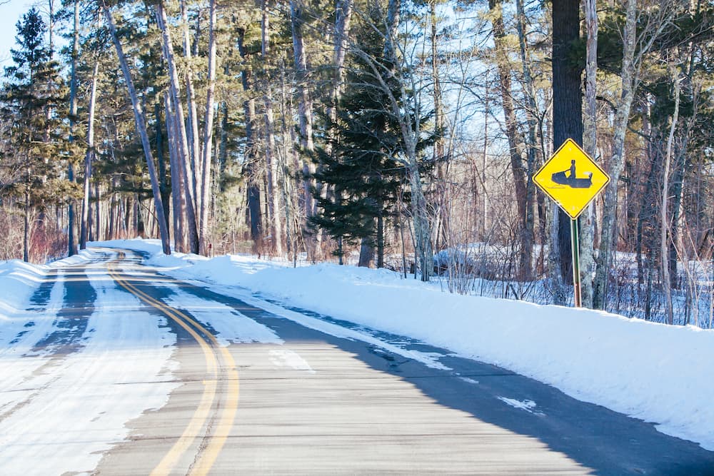 Snowy roads winding down