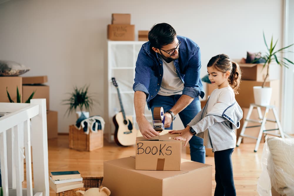 Family packing items for there long distance move.