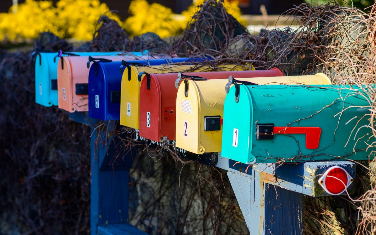A row of residential mailboxes after a change of address
